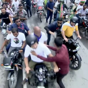 Overexcited Fan Kisses Rahul Gandhi During Bike Rally, Security Breach Sparks Concern