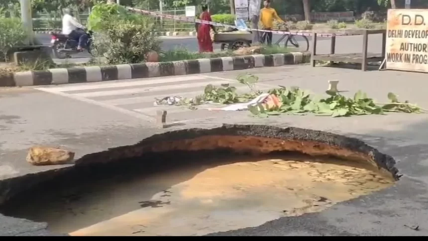 Road Collapses Near National Law University in Delhi’s Dwarka Amid Heavy Rainfall