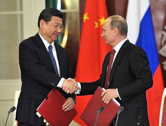 fpht00k8_xi-putin_625x300_15_February_26 Putin Set for Crucial China Visit Days After Trump-Xi Summit