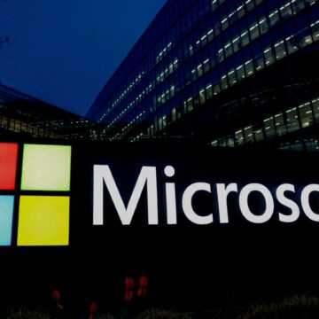 FILE PHOTO: A Microsoft logo is seen in Issy-les-Moulineaux near Paris Microsoft Posts Strong Quarterly Growth as Cloud and AI Investments Drive Record Performance
