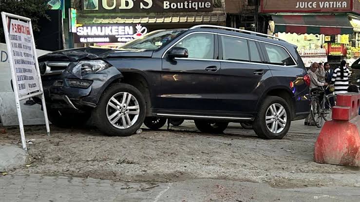 images (28) Wrong-Way Scooter Collision with Mercedes in Gurugram Leaves One Dead, Sparks Fresh Road Safety Concerns