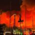 Massive Fire Breaks Out Near Galveston Wharf Road, Emergency Crews Battle Flames as Seafood Restaurant Clarifies Situation